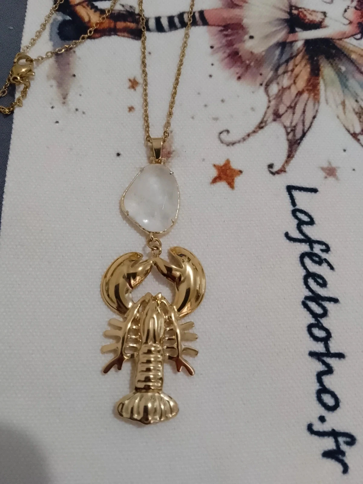 Collier homard et pierre de cristal de roche